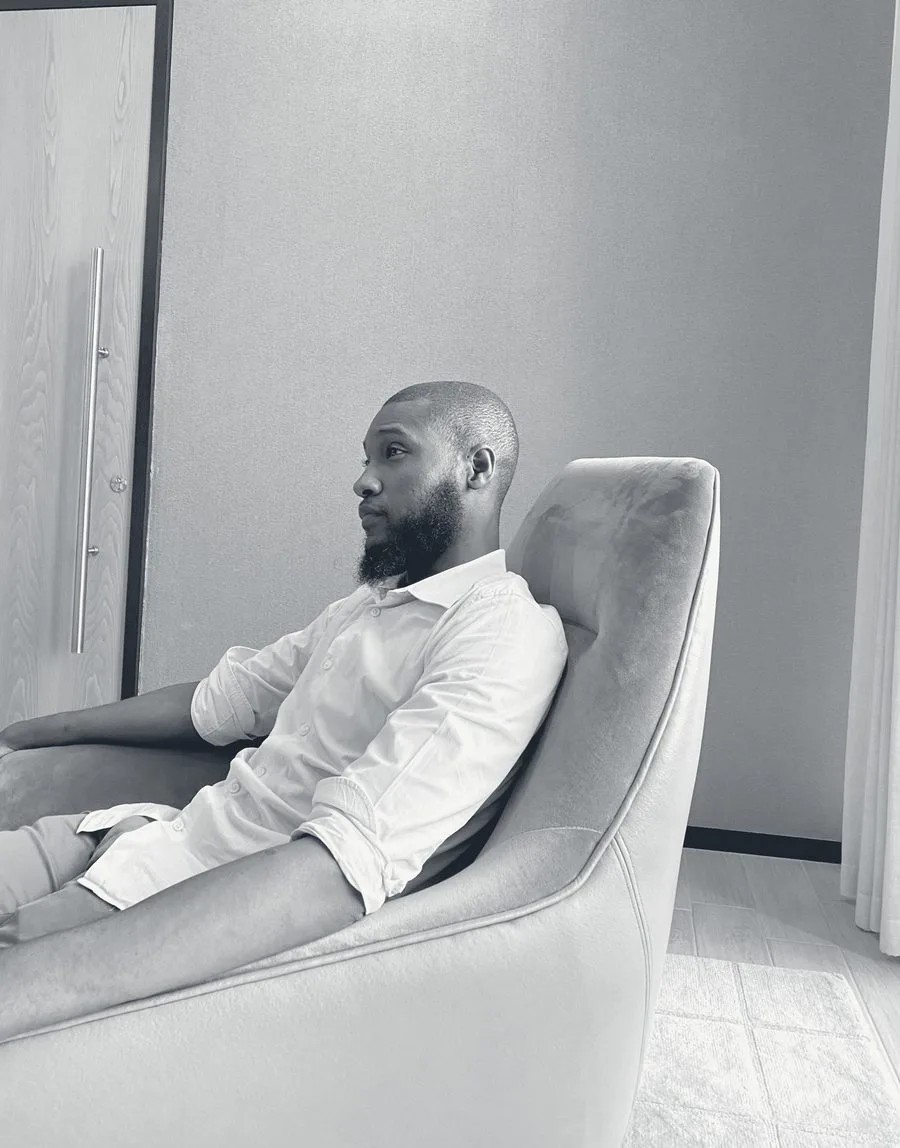 Munir, sitting
